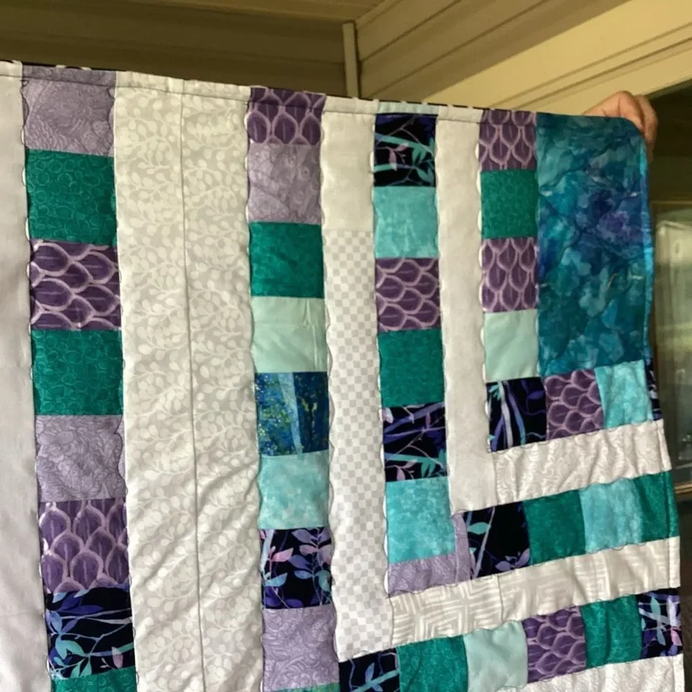 NWT. Hand Crafted Quilt of Blues, Purples and Turquoises